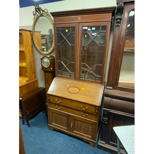 732 - An Edwardian mahogany inlaid bureau bookcase