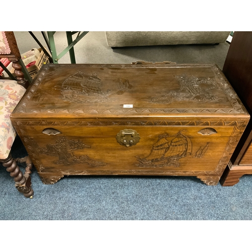 743 - A carved Eastern camphorwood chest W 94 cm