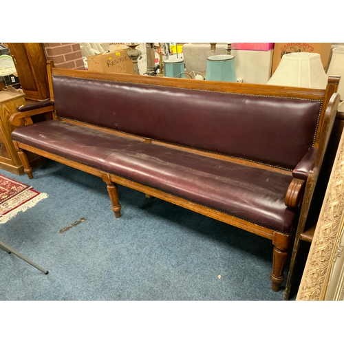 750 - A late 19th century oak framed upholstered bench L 245 cm