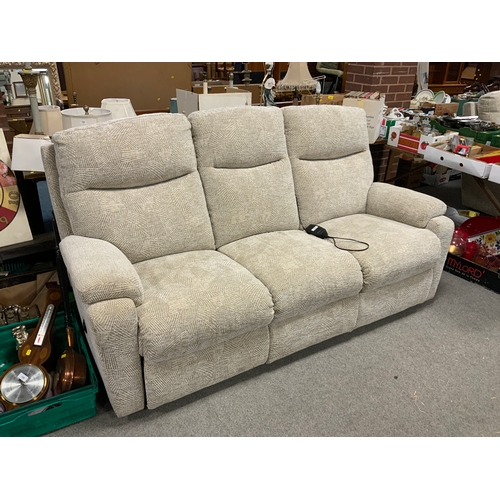 758 - A modern upholstered four piece electric suite with three and two seater settees, armchair and stool... 