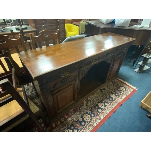 769 - A large Edwardian mahogany carved sideboard W 182 cm