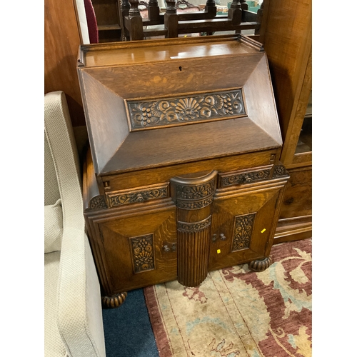 806 - A heavy carved oak bureau W 84 cm