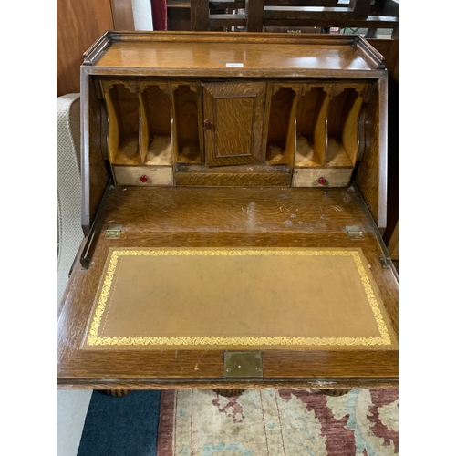 806 - A heavy carved oak bureau W 84 cm