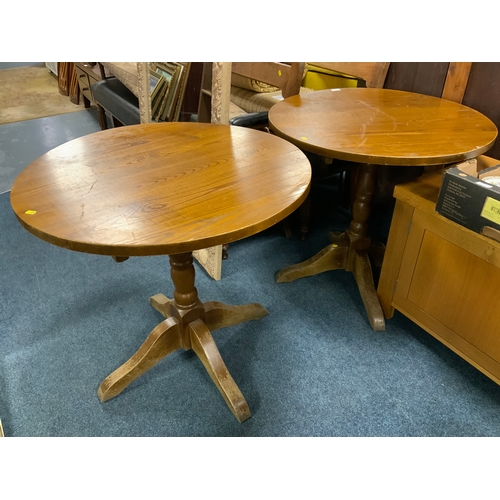 817 - A pair of circular pub style tables (2)