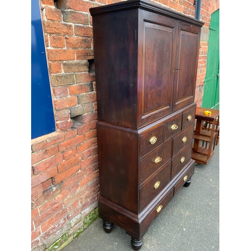 831 - A Georgian mahogany cupboard on chest with an arrangement of nine drawers H 185 cm W 123 cm