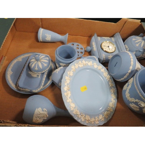 115 - A tray of Wedgwood green jasperware together with a tray of Wedgwood blue jasperware (2)