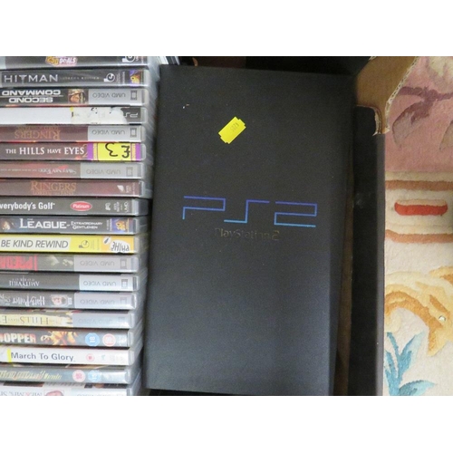 131 - A PlayStation 2 with games