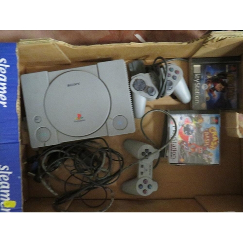 132 - A box containing PlayStation console games, remote etc