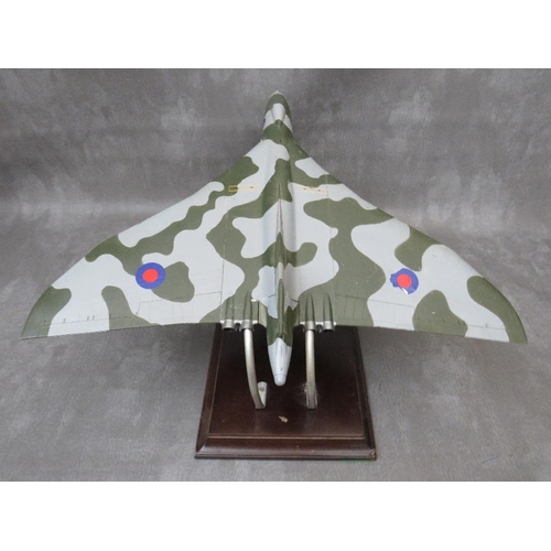 203 - A model of a Vulcan bomber XH558 on display stand, wing span 47 cm