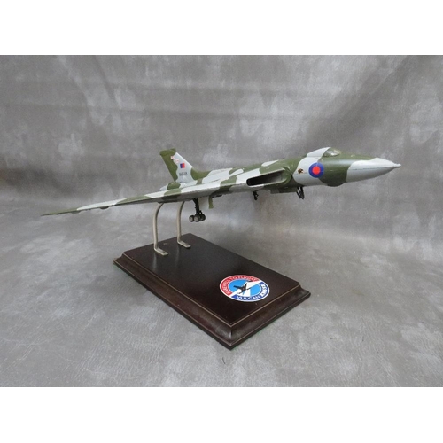 203 - A model of a Vulcan bomber XH558 on display stand, wing span 47 cm