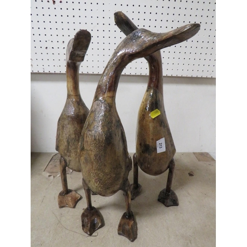 213 - Three lacquered carved wooden ducks