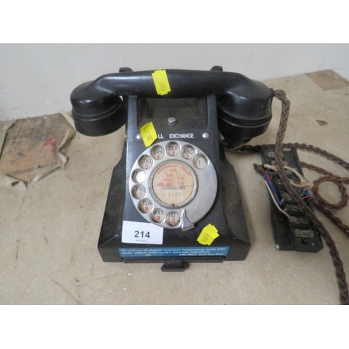 214 - A vintage exchange telephone with pull out index