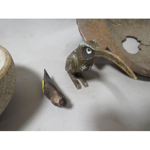 225 - Three 19th century treen bowls - one date 1811 - 1841, a carved stone bird and an Egyptian painted g... 