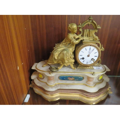 238 - A 19th century gilt metal mantle clock