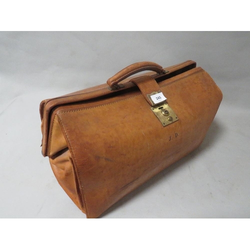 245 - A vintage leather Gladstone style bag