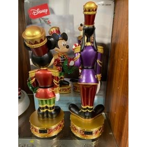 305 - A set of Christmas Disney Mickey Mouse and Goofy nutcracker figures with lights and music, boxed new... 