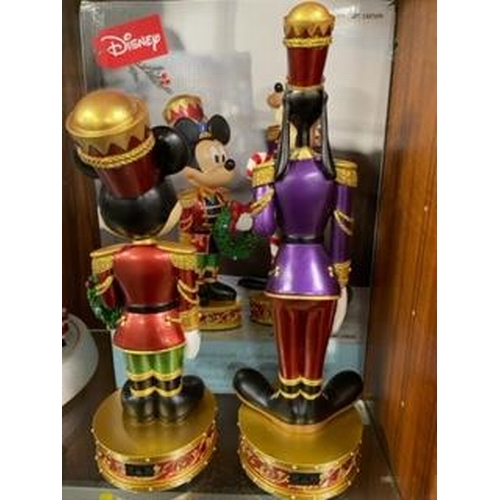 305 - A set of Christmas Disney Mickey Mouse and Goofy nutcracker figures with lights and music, boxed new... 