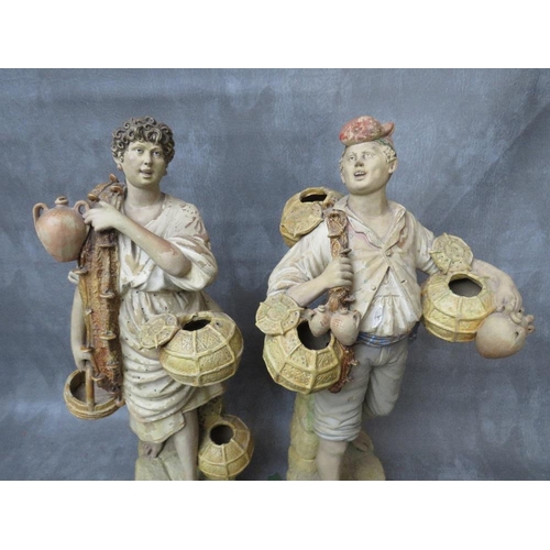 320 - A pair of large terracotta Continental hand painted figures, early 20th century, depicting fishermen... 