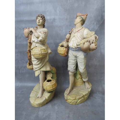 320 - A pair of large terracotta Continental hand painted figures, early 20th century, depicting fishermen... 