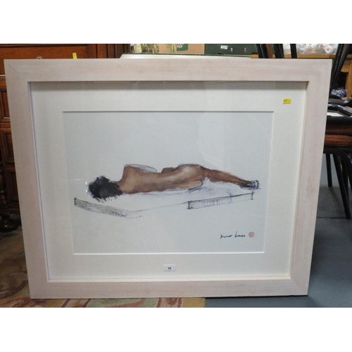 38 - A framed glazed print of a reclining nude by Bruno Haas