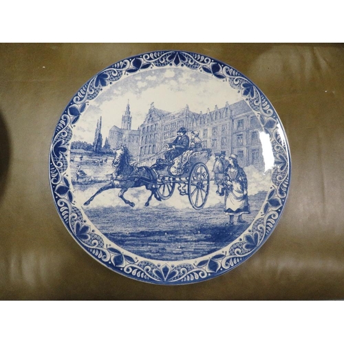 53 - Three Delfts Blauw hand painted equestrian themed chargers together with a tray of blue and white wa... 