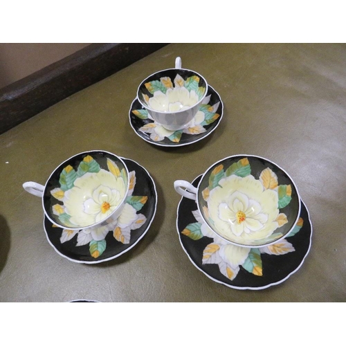 66 - Six hand painted floral design Tuscan cups and saucers