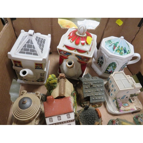 69 - A tray of assorted ceramics to include collectable teapots, Old Tuptonware cat etc