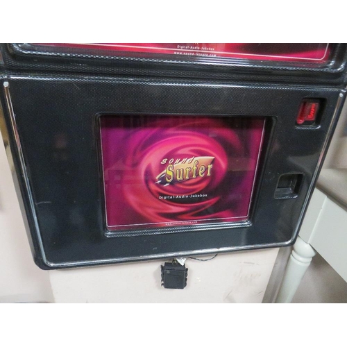 712 - An illuminated wall mounted 'Sound Surfer' juke box front panel repurposed as a mirror