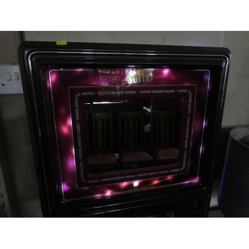 712 - An illuminated wall mounted 'Sound Surfer' juke box front panel repurposed as a mirror