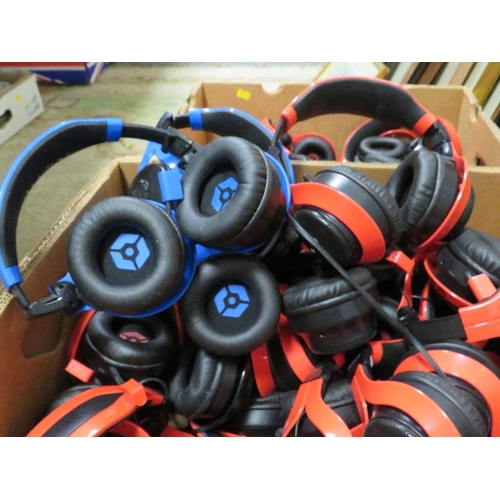 74 - Two boxes of Giotec headphones