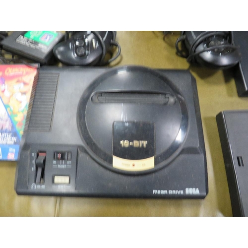 78 - A Sega Megadrive with games & controllers