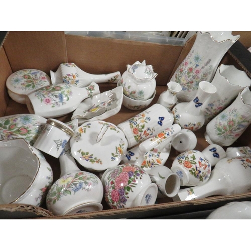 83 - Two trays of assorted ceramics to include a large selection of Aynsley vases, ornamental china etc. ... 