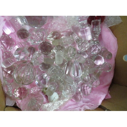 94 - A box of assorted glass stoppers for decanters and bottles (Approx 40+)