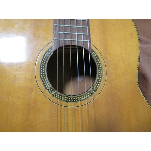 260 - A vintage acoustic guitar with case