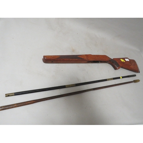 268 - A rifle stock and two cleaning rods