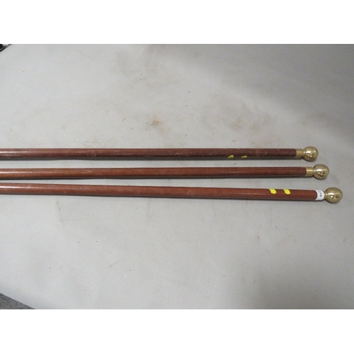 270 - Three novelty waking canes with inset compass to pommel - unscrew to to see compass