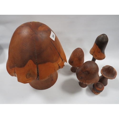 283 - A collection of carved wooden mushrooms