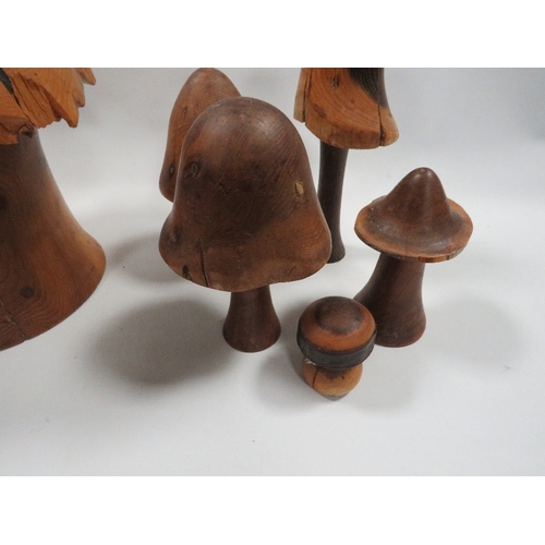 283 - A collection of carved wooden mushrooms