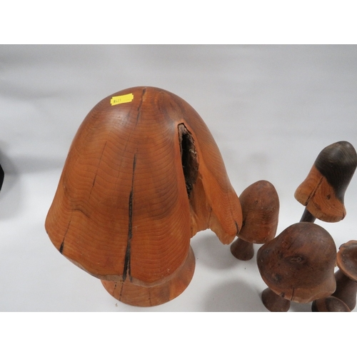 283 - A collection of carved wooden mushrooms