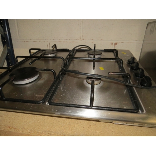 578 - A stainless steel gas hob / extraction unit together with a sink