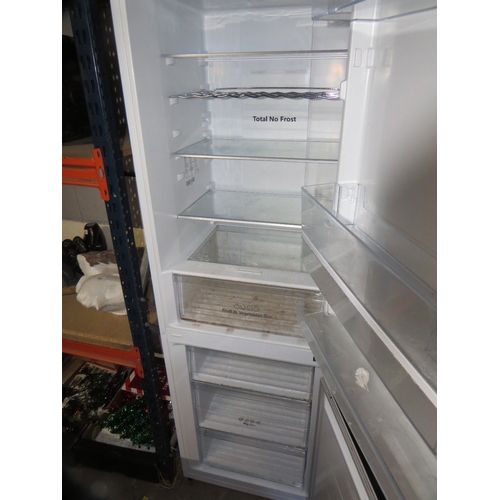 582 - A Hisense fridge freezer