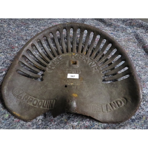 587 - An R & F Keane cast iron tractor seat - possibly reproduction