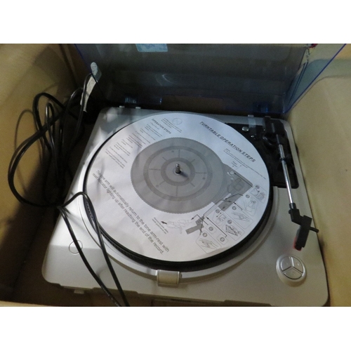 592 - A boxed Tevion UNB turntable record recorder