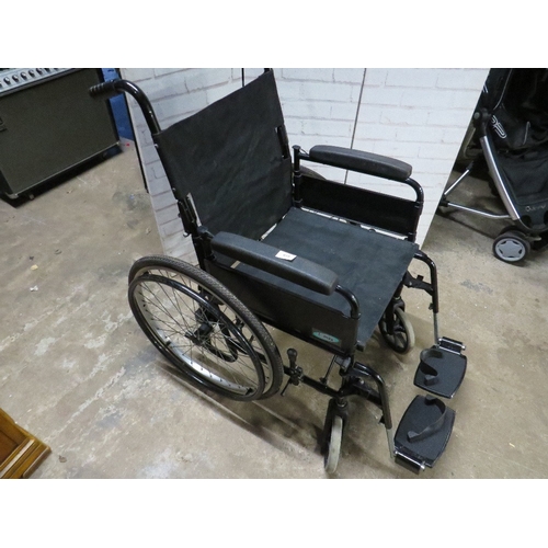 615 - A Lomax self propelled fold away wheel chair