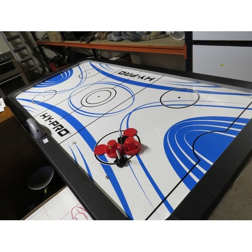 617 - A fold away air hockey table