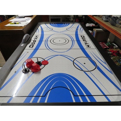 617 - A fold away air hockey table