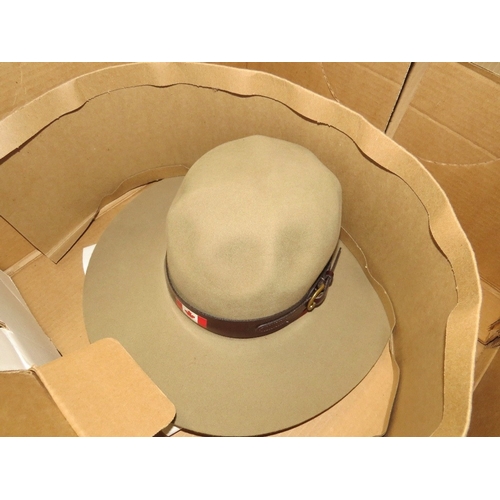 618 - A selection to include a steel locking storage trunk, a boxed Canadian Western hat and a vintage set... 