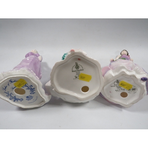 325 - A Royal Doulton figurine 'Julia', together with 'Jessica' and a Coalport figurine (3)