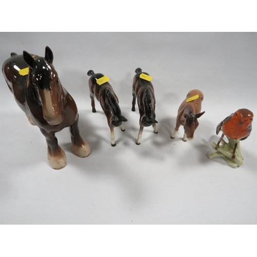 354 - Two Beswick foals - one tail reglued,  plus a donkey, a shire horse and a Goebel robin (5)