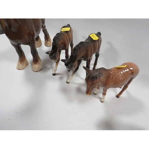 354 - Two Beswick foals - one tail reglued,  plus a donkey, a shire horse and a Goebel robin (5)